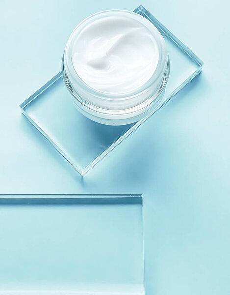 Face cream moisturiser jar on glass and mint background, beauty product and skincare, cosmetic science concept