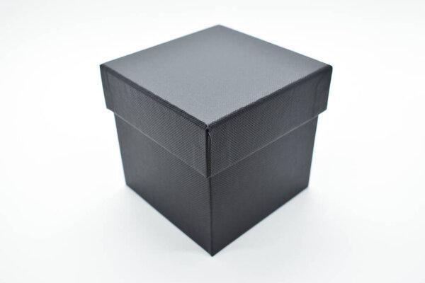 black paper box on white background, packaging industry