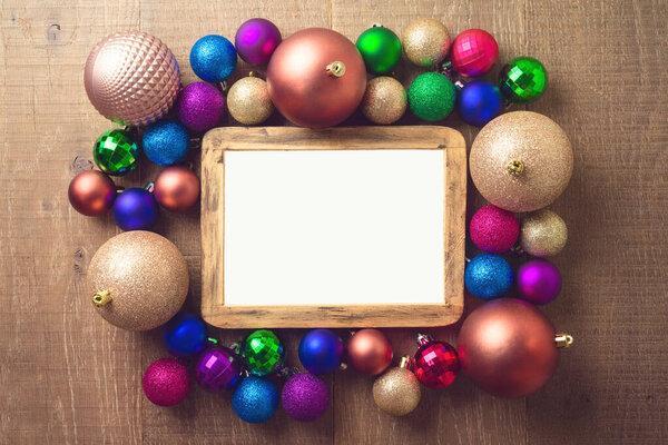 Merry Christmas and Happy New Year background with modern decorations and frame mock up. Top view with copy space