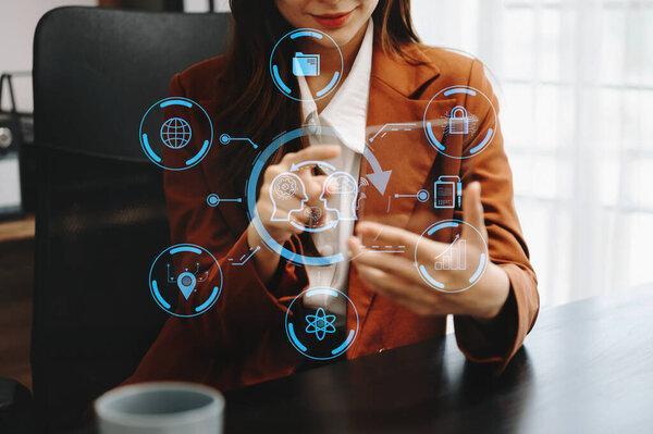 Woman using chatbot in computer and tablet  smart intelligence Ai.Chat with AI Artificial Intelligence, developed by OpenAI generate. Futuristic technology, robot in online system. in office