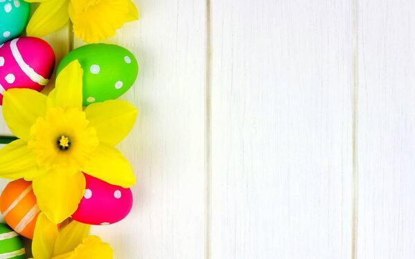 Colorful Painted Easter eggs on a wooden table. 