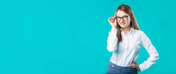 Blank for advertising. Portrait young caucasian woman worker teacher coach mentor in white shirt office style business lady leader advertising glasses eyesight blue isolated color background.