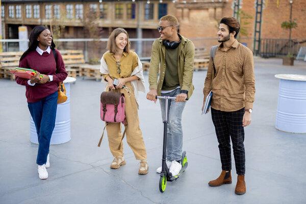 Students walk together at university campus