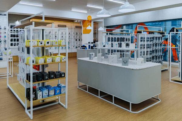 Surakarta, Indonesia, May 24, 2025：View of Modern electronics store showcasing various mobile phone accessories and gadgets.