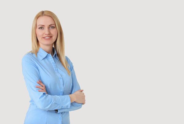 Business woman portrait on gray backgroung