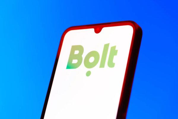 Prague, Czechia - 10 21 2024: Smartphone on surface showing Bolt logo.