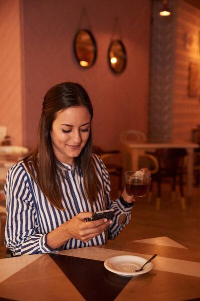 Young woman using smartphone