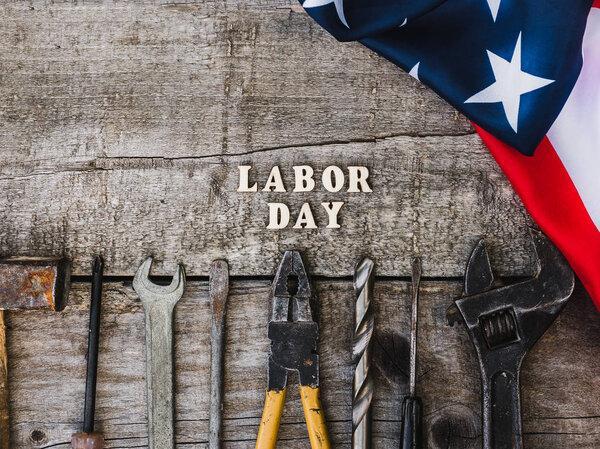 LABOR DAY. Hand tools and wooden letters