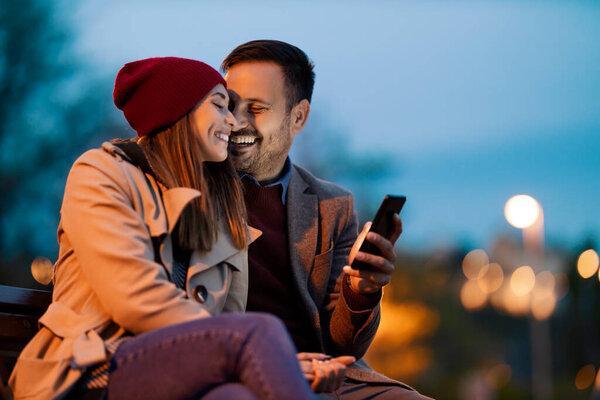 Loving young couple hugging and smiling together.Romantic date.