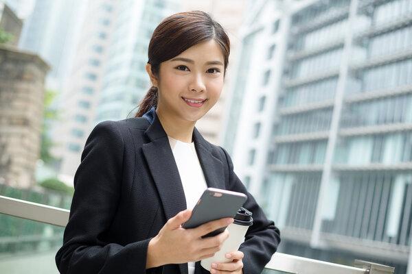 Young asian businesswoman in business suit