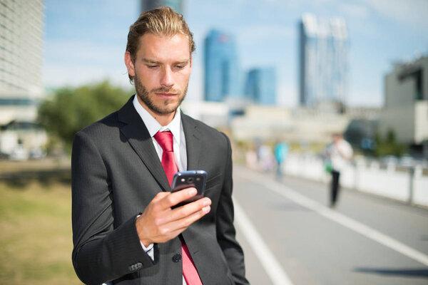 businessman using his mobile phone