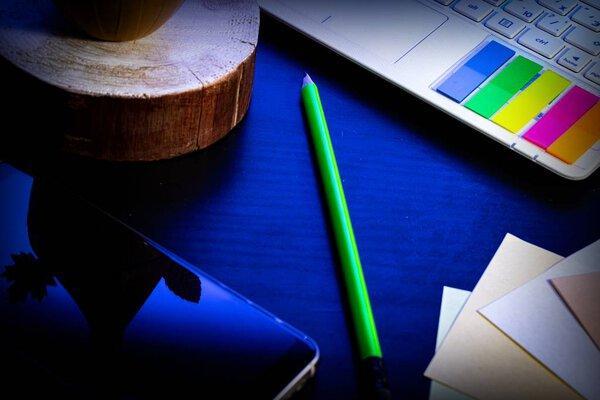 Background with laptop, smartphone, pencil