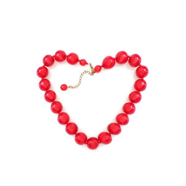 Red round beads isolated on a white background