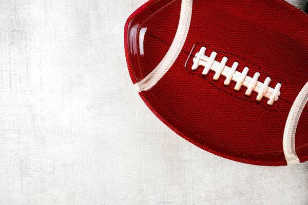 American football background with plate and copy space for your text or food. Banner, mockup.