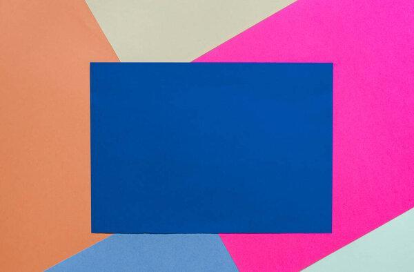 Light blue sheet of paper with place for your text on a colored background.