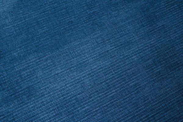 Textured corduroy furniture fabric in orange blue close-up