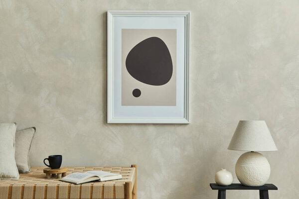 Stylish minimalistic composition of cozy living room interior with mock up poster frame, chaise longue, white lamp, coffee table and elegant personal accessories. Neutral beige wall. Template.