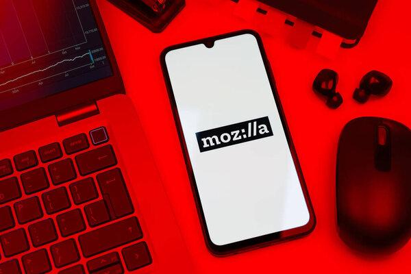 Prague, Czechia - 10 21 2024: Smartphone on surface showing Mozilla logo.