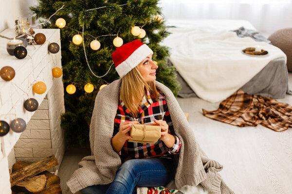 Beautiful Woman at Christmas time at home