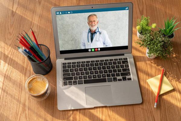 Doctor video call online by modish telemedicine software application for virtual meeting with patient