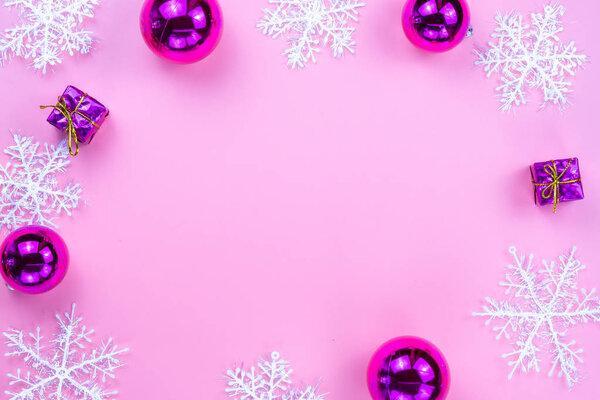 Christmas holidays composition, top view of pink Christmas decor