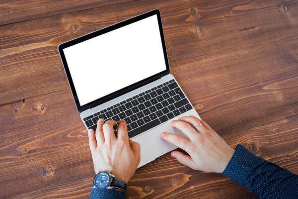 Business man working on laptop computer. Laptop screen mockup.