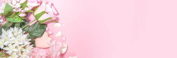 Pink and white spring holiday background with various cute tender flowers. Valentine day, international women's day 8 march, birthday, mother's day greeting card mockup top view flatlay frame