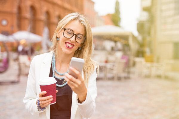 Woman chatting and having coffee