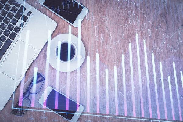 Multi exposure of financial chart hologram over desktop with phone. Top view. Mobile trade platform concept.