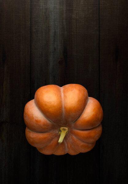 Autumn background . pumpkins on wooden vintage table. Autumn concept . Thanksgiving pumpkins. autumn market. Pumpkin background. pumpkin waiting to be sold.