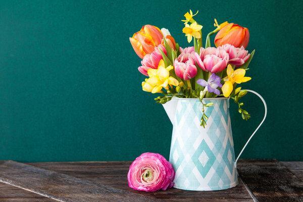 Little bouquet made from bright cheerful spring flowers
