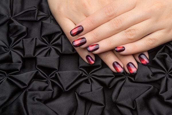 Beautiful woman's nails with nice stylish manicure.