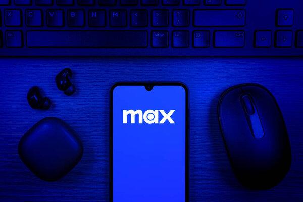 Prague, Czechia - 10 21 2024: Smartphone on surface showing Max logo.