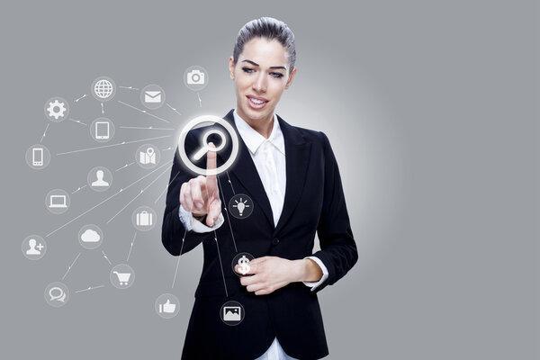 Businesswoman pushing touch cloud button