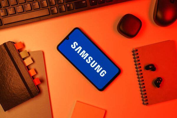 Prague, Czechia - 10 21 2024: Smartphone on surface showing Samsung logo.