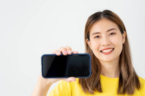 excited young woman play games by mobile phone make winner gesture. female winning mobile gambling. Wow face expression. Esport streaming game online, surprise, gamer, online, earning, new generation.