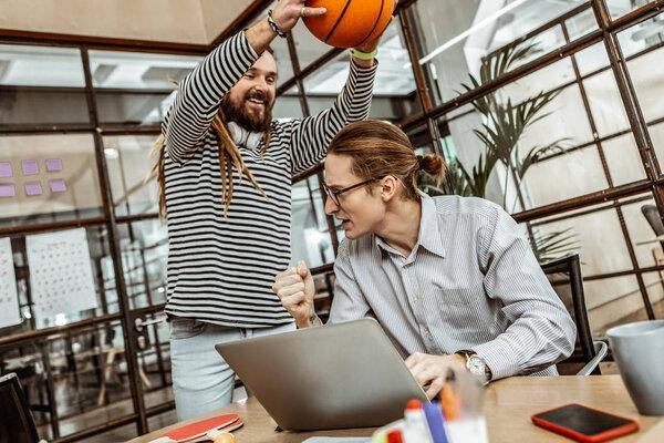 Young colleagues working in modern office together