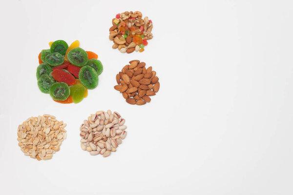Nuts mix, beer snacks. Light white background. 