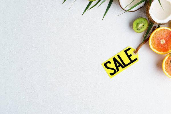 summer vacation sale, price tag and exotic fruits