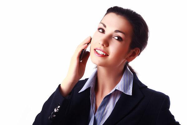 Attractive inspired businesswoman with mobile phone