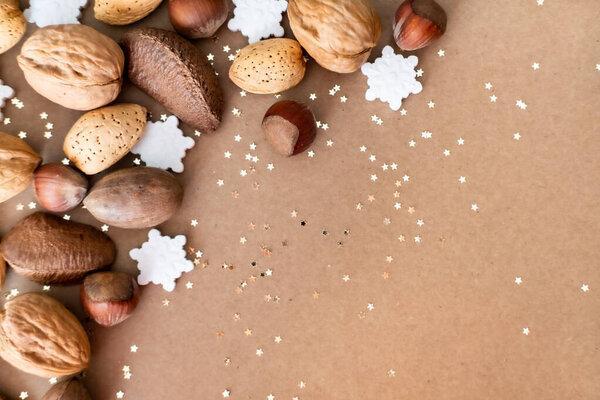 Christmas decorations and nuts background.
