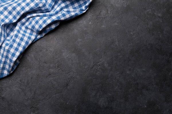 Kitchen table with tablecloth and space for your recipe or menu. Top view flat lay