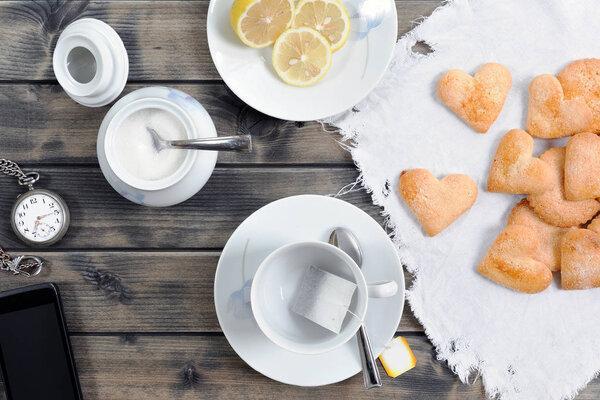 Breakfast with tea and biscuits