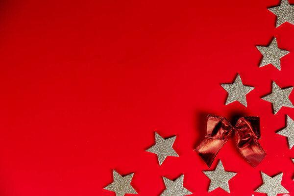 Christmas holidays composition on red background with copy space for your text