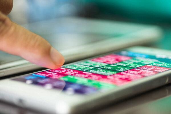 stock market application on touchscreen smartphone