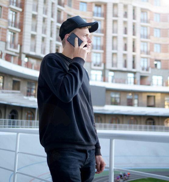 Young man talking on the phone