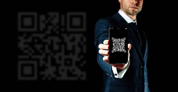 Scan qrcode. Digital mobile smart phone with qr code scanner on smartphone screen for payment, online pay, scan barcode technology man holding. Retail shop accepted digital pay without money
