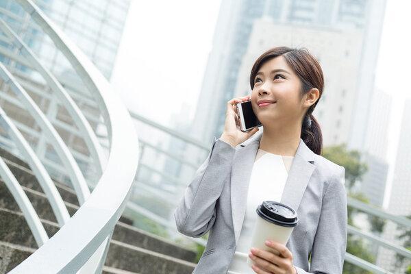Businesswoman using smart phone
