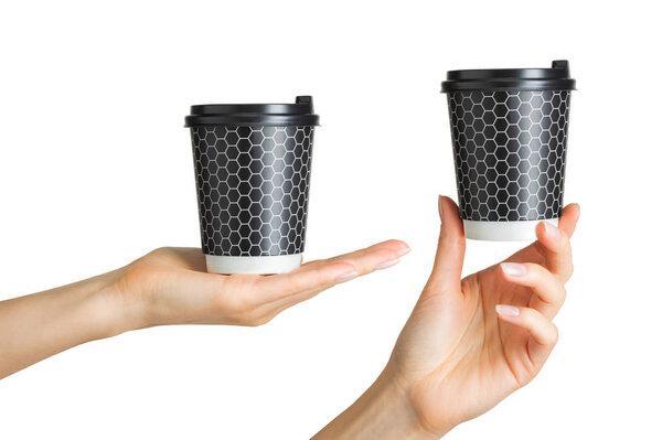 Set of women hands holding coffee paper drinking cup