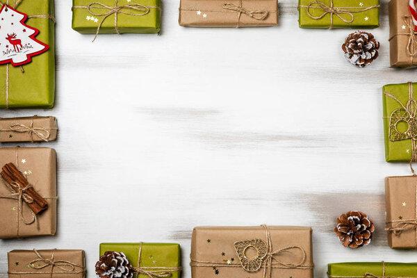 Christmas composition gift boxes with pine tree and decoration for mock up template design. View from above. copy space